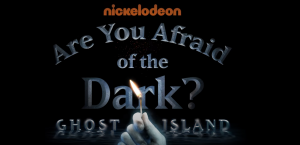 Article Image shows a pale hand holding up a lit matchstick. Text behind it reads: Are You Afraid of the Dark? Ghost Island. The Nickelodeon logo is at the very top of the image.